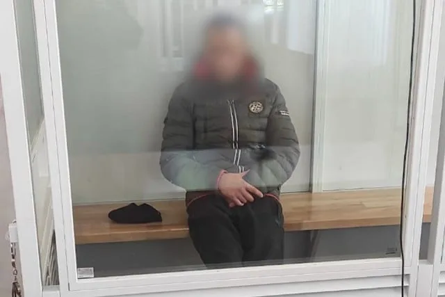 чоловік під вартою